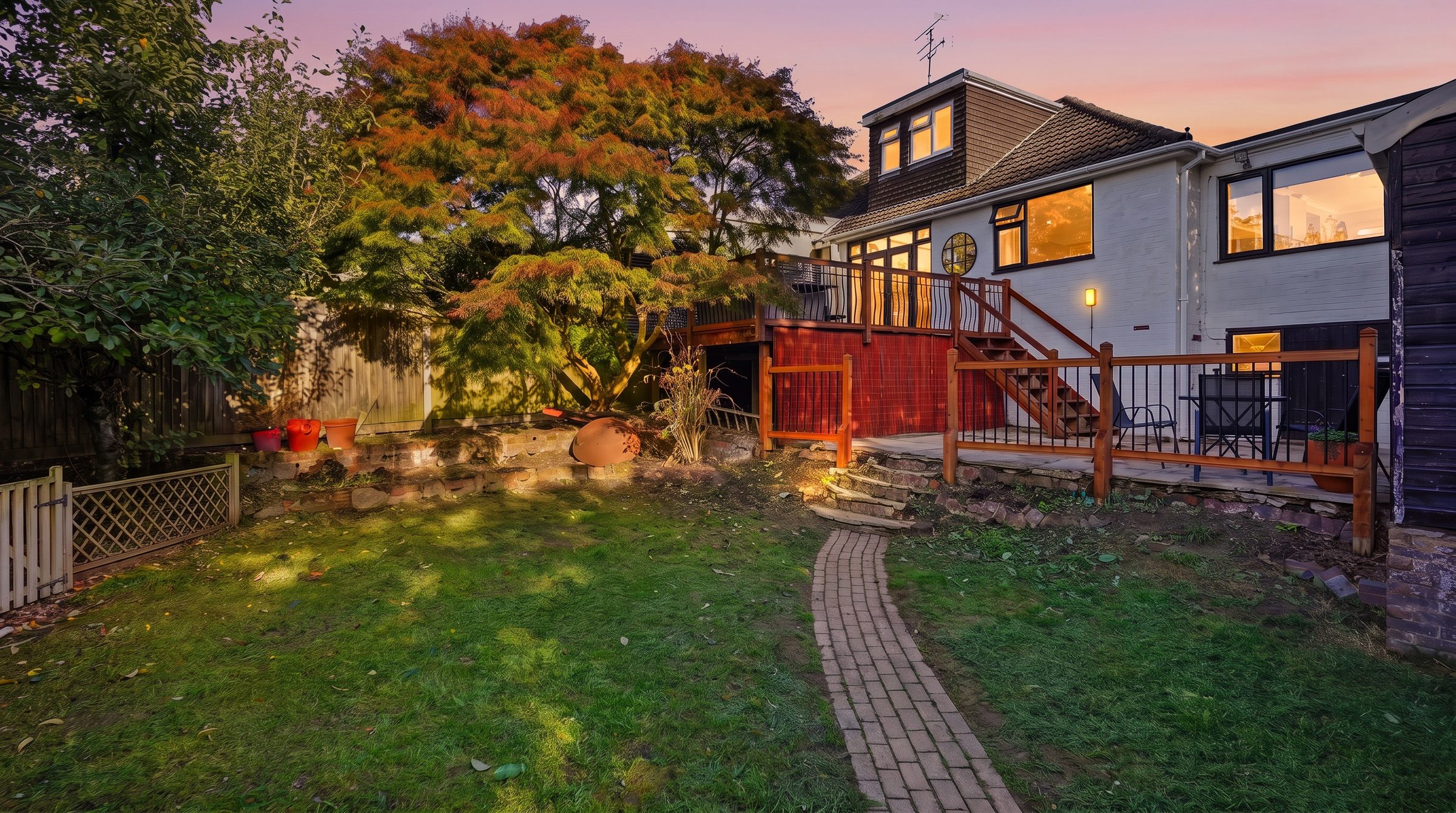 The back of the house at dusk from the garden